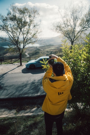 man taking picture from the other side