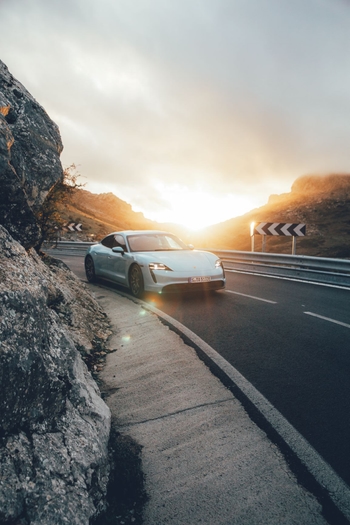 taycan road and sunlight